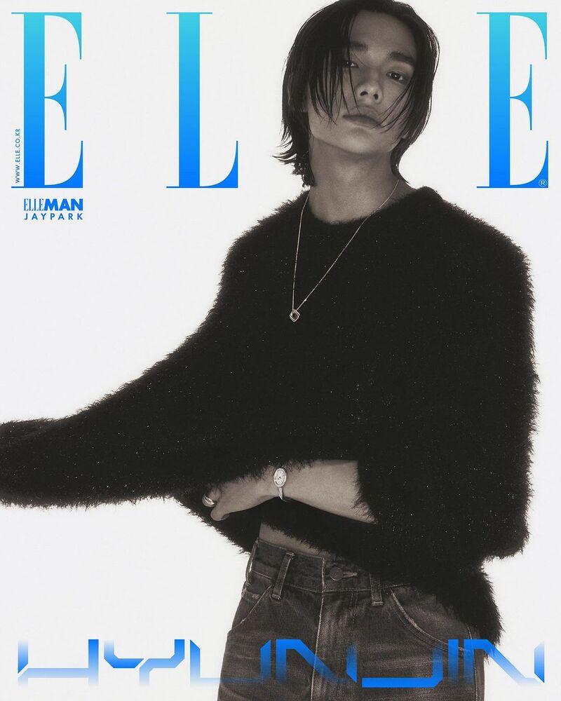 Hyunjin makes a striking statement in a textured black sweater, accessorized with Cartier elegance for Elle Korea's May 2024 cover.