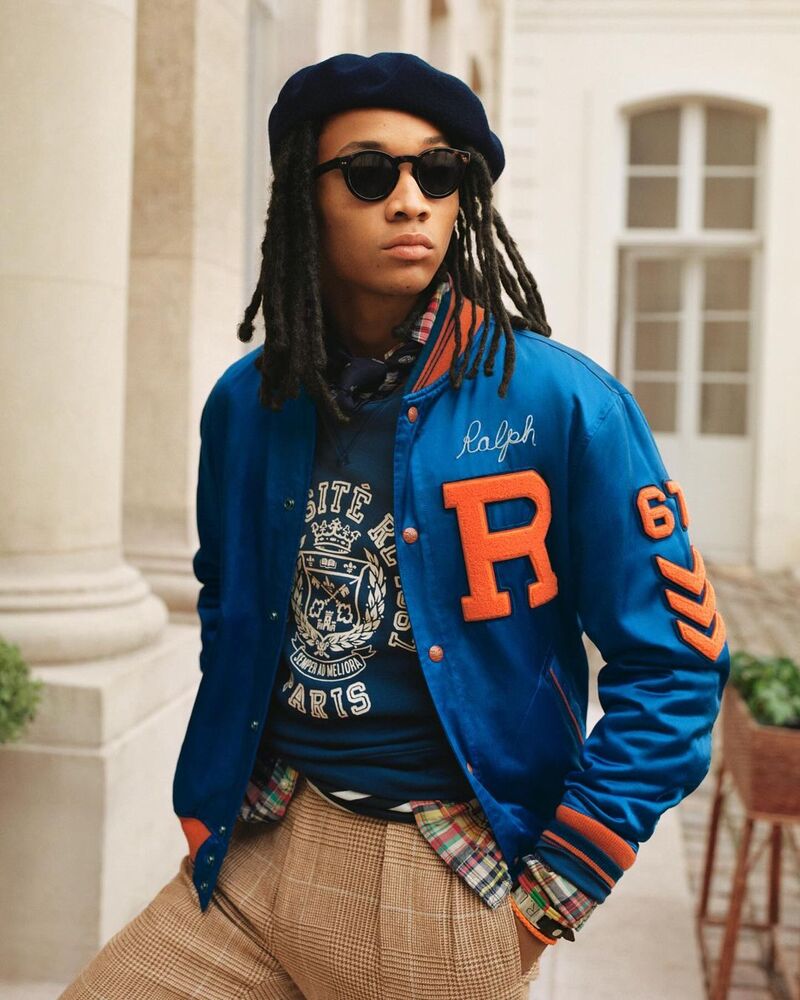 Justice wears a beret with a satin letterman's jacket from Polo Ralph Lauren's spring-summer 2024 collection.