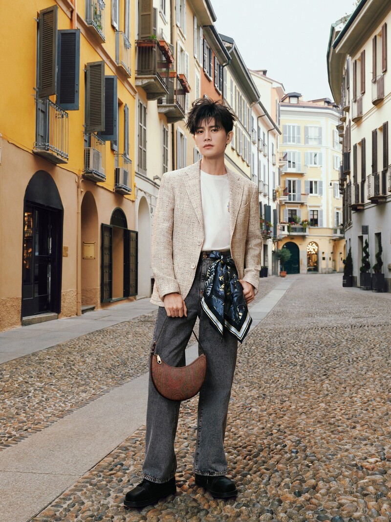 Actor and singer Ren Jialun fronts Etro's spring-summer 2024 campaign, wearing a tweed blazer with jeans.