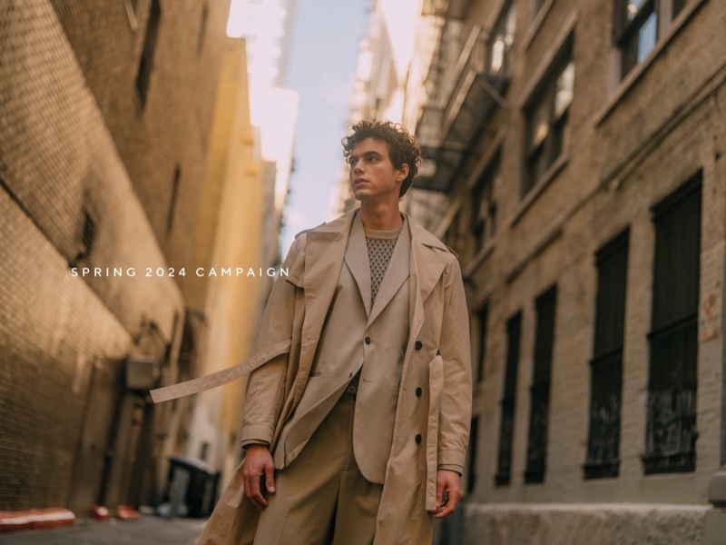 Pablo Kaestli navigates a cityscape in a classic trench and suit for Reserved's spring 2024 campaign.
