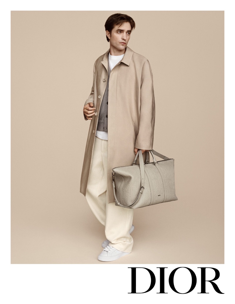 Robert Pattinson dons a relaxed yet refined look with a statement bag for Dior's spring 2024 Icons campaign.