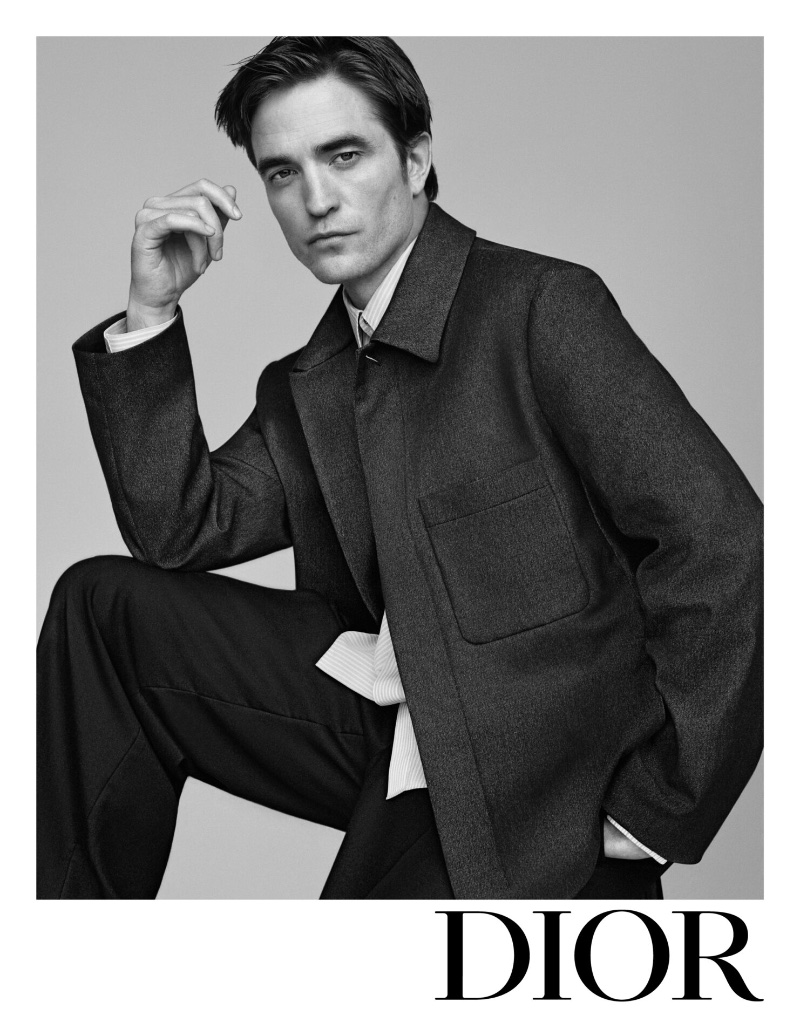 Actor Robert Pattinson poses in Dior's sleek tailoring for the spring 2024 Icons ad.