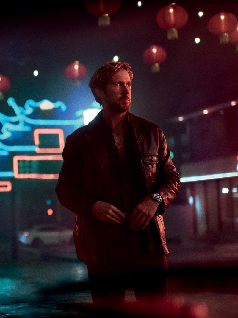 Against a neon-lit night, Ryan Gosling fronts the 39mm TAG Heuer Carrera Chronograph advertisement.
