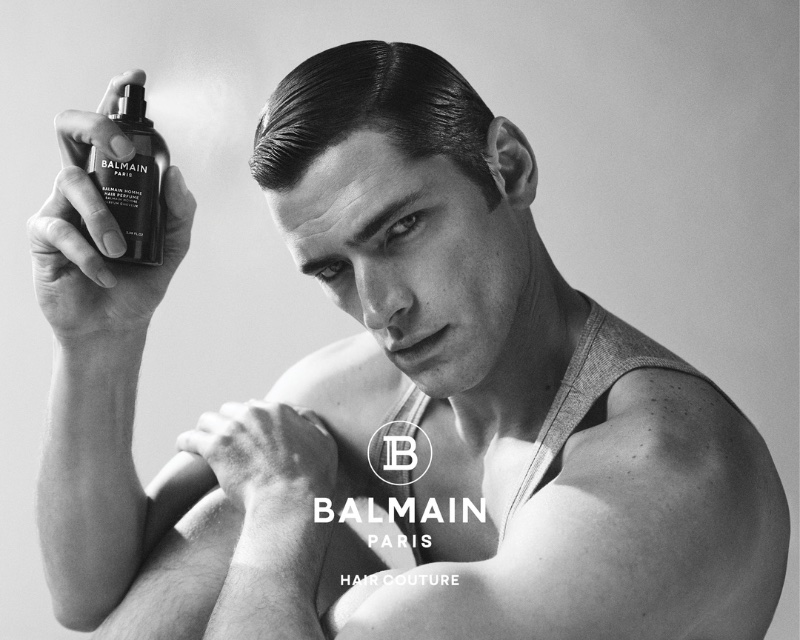 Sean O'Pry showcases Balmain Hair Couture hair perfume.