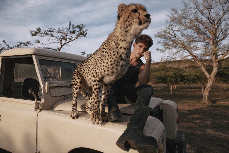 Model Stijn van Dongen poses with a cheetah, photographed by Thomas Unterberger