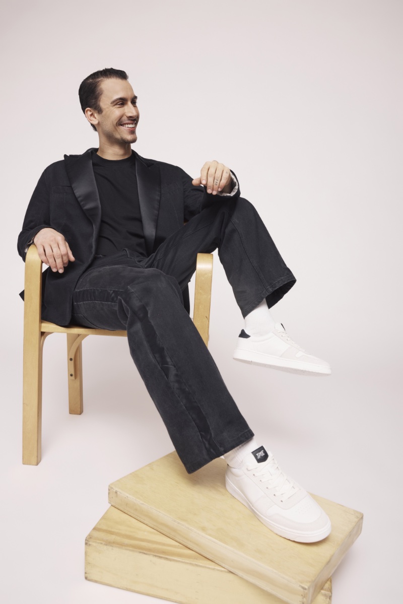 Sporting white sneakers, Christian Cowan stars in TOMS' Wear Good campaign for spring-summer 2024.