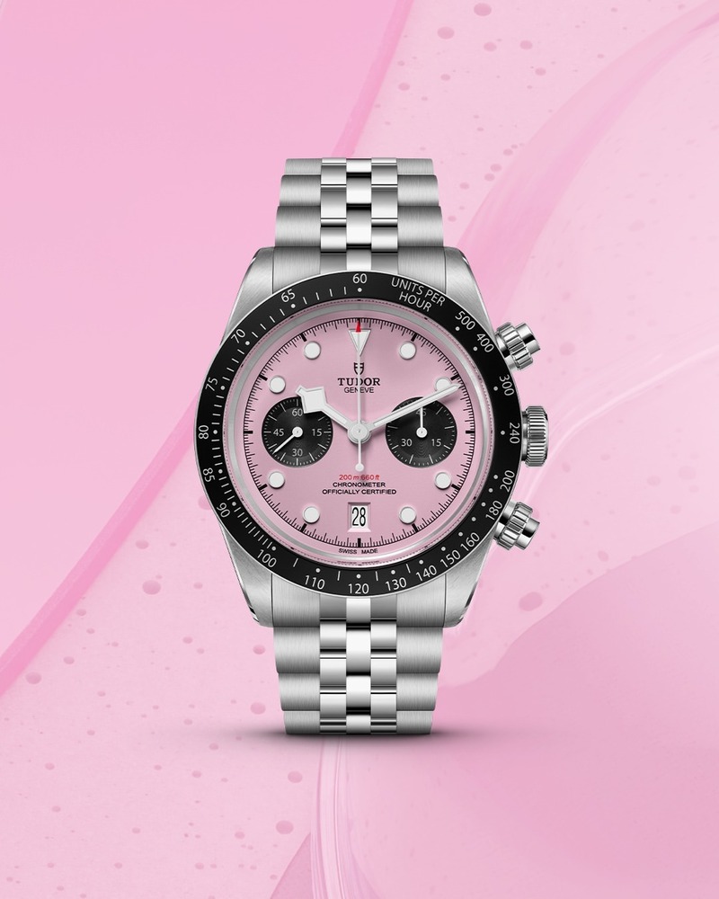 The TUDOR Black Bay Chrono Pink stands out with its elegant design against a playful pink backdrop.