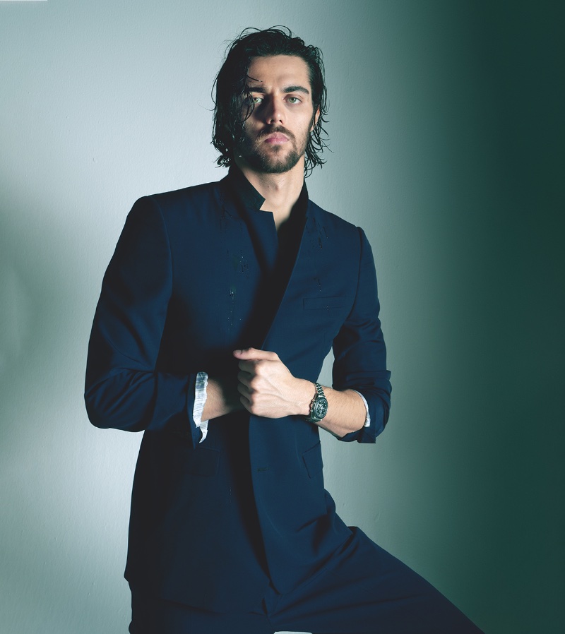 Featured in Corriere della Sera Style, Thomas Ceccon is styled in a navy Dior suit.