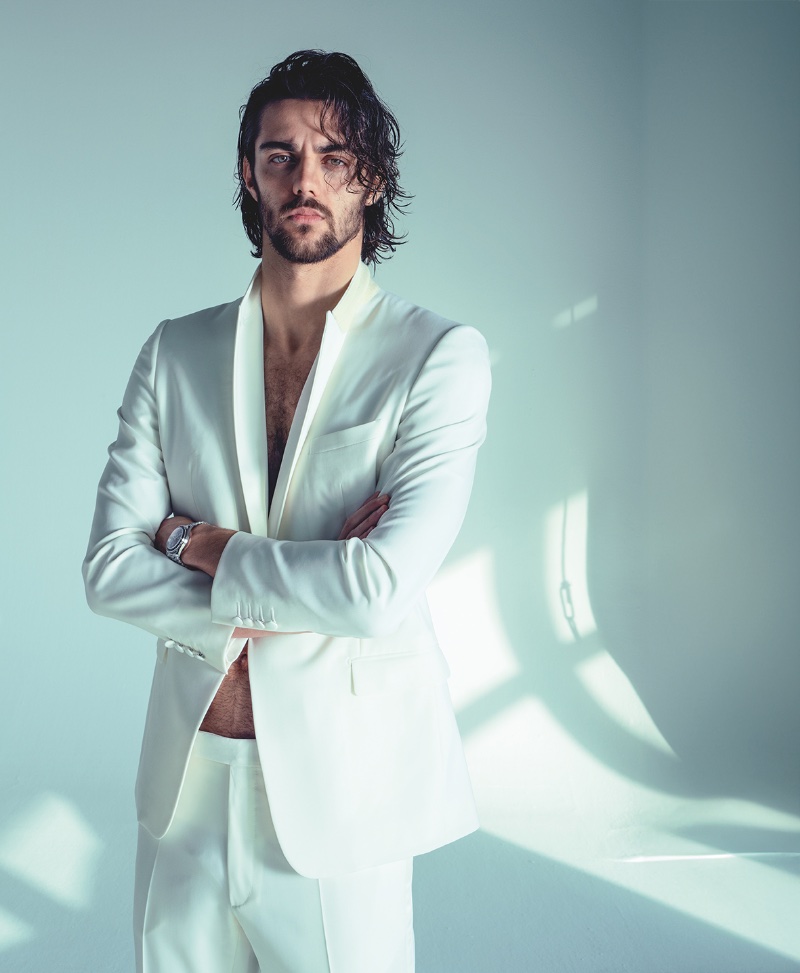 Corriere della Sera Style features Thomas Ceccon in a white Dior suit.