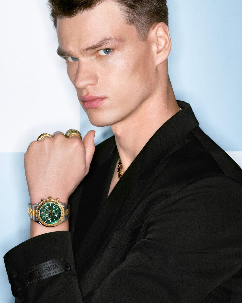 Model Filip Hrivnak wears the emerald Versace Chrono Master watch for the spring-summer 2024 campaign.
