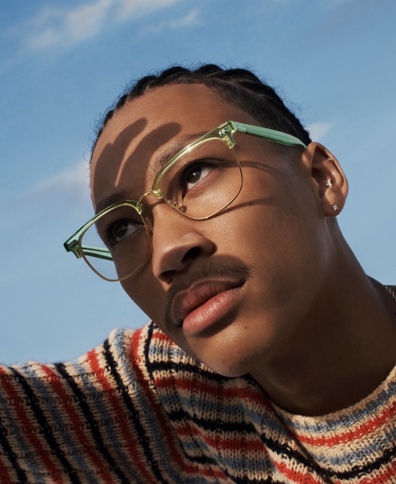 Skateboarder Lil Dre models Warby Parker's Baird glasses.