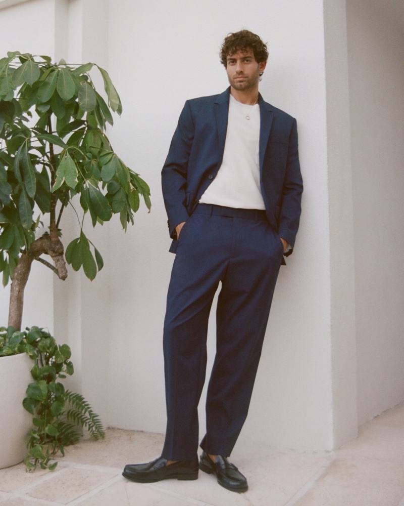 A navy blue suit from Abercrombie & Fitch combines timeless tailoring with the versatility needed for formal and semi-formal settings. 