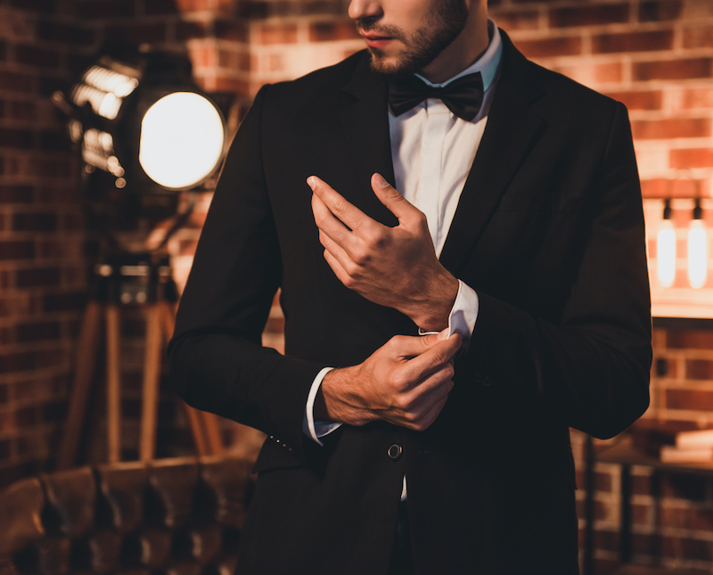 Bow ties bring a playful sophistication to any groom's ensemble.