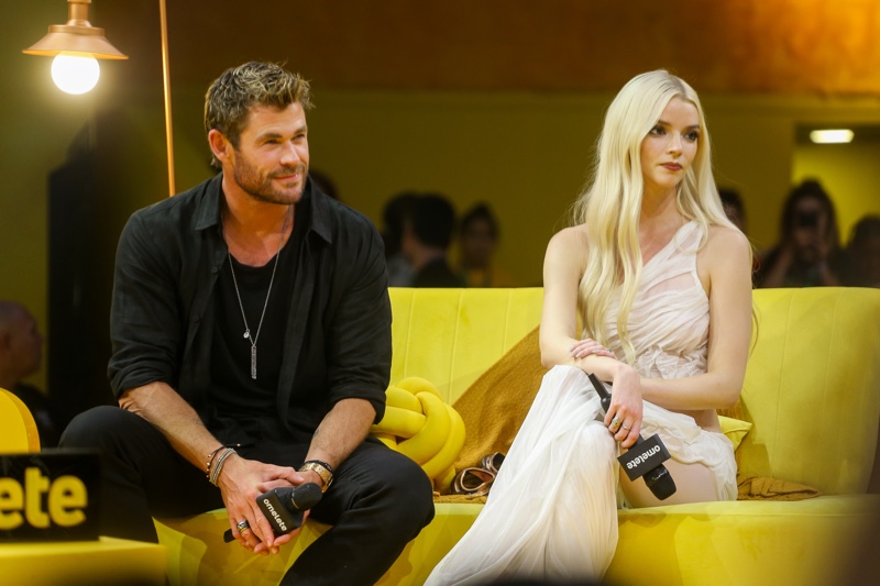 Wearing all-black attire, Chris Hemsworth attends the Comic Con Experience (CCXP) in São Paolo with his Furiosa: A Mad Max Saga costar Anya Joy-Taylor.