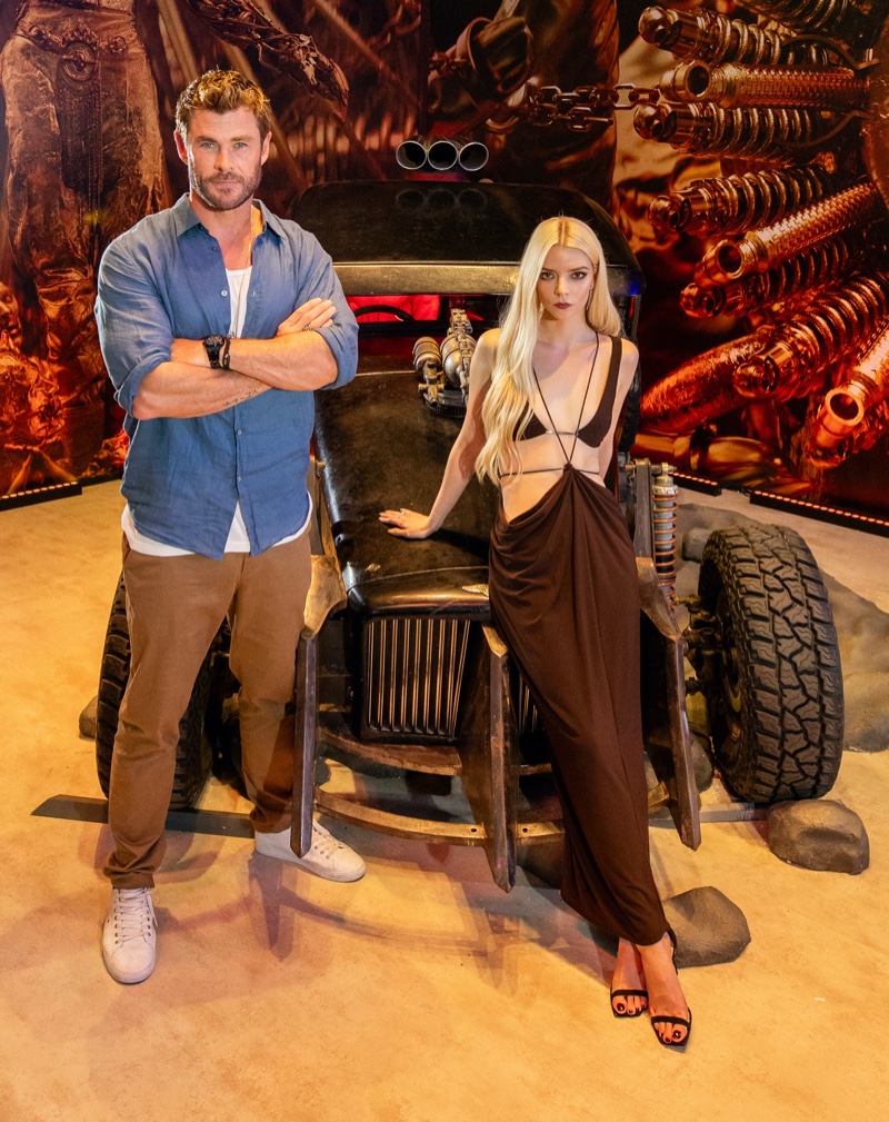 Sporting a linen shirt, Chris Hemsworth poses with his Furiosa: A Mad Max Saga costar Anya Joy-Taylor at a photocall.