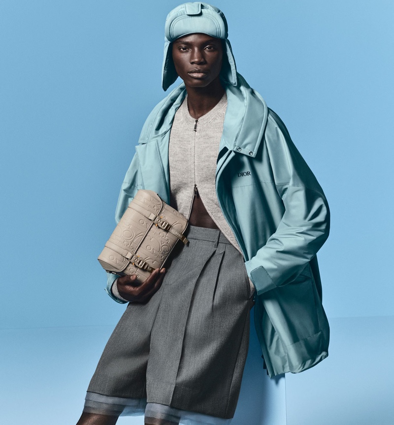 Dara Gueye stands out in a layered ensemble for Dior's fall 2024 campaign.