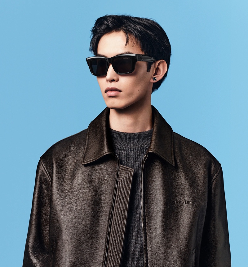 Yifan Lu models a leather jacket with stylish sunglasses for Dior's fall 2024 campaign. 