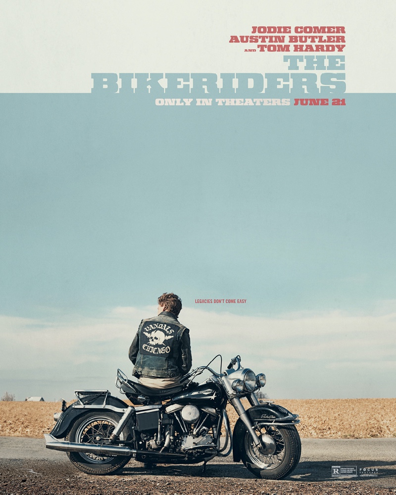 A promotional poster for The Bikeriders with Austin Butler as Benny, sitting on his bike.