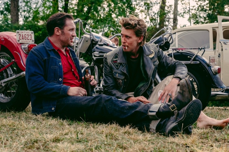 The Bikeriders scene with Tom Hardy as Johnny and Austin Butler as Benny. 