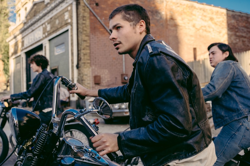 As The Kid in The Bikeriders, Toby Wallace cruises the city streets in a timeless black leather jacket. 