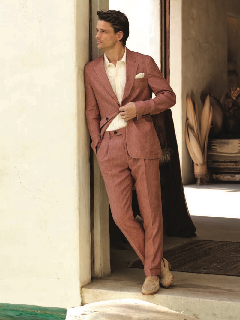 Simon Nessman dons Todd Snyder's Italian linen Madison suit with a polo and Todd Snyder x Sanders Edwin loafers.