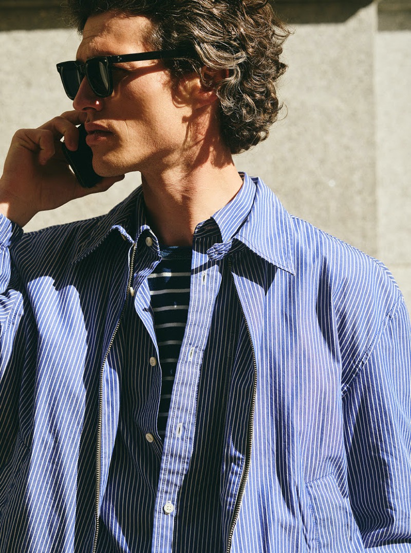 Alex Mill striped lightweight zip jacket and short-sleeve Mill shirt. » Alex Mill Lightens Up for Summer 2025 in Madrid Alex Mill striped lightweight zip jacket and short-sleeve Mill shirt.