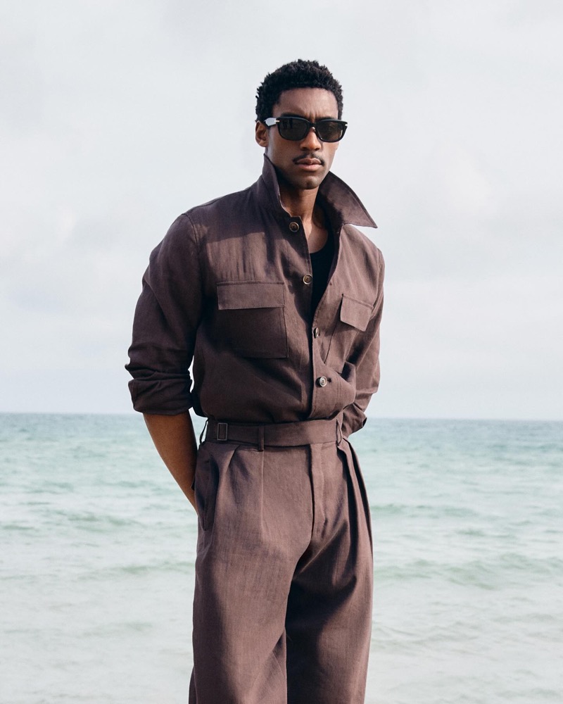 Halid Nuhu models BOSS' squared acetate sunglasses with gold-tone trims. » BOSS Eyewear Sets a Chic Summer Scene by the Beach Halid Nuhu models BOSS' squared acetate sunglasses with gold-tone trims.