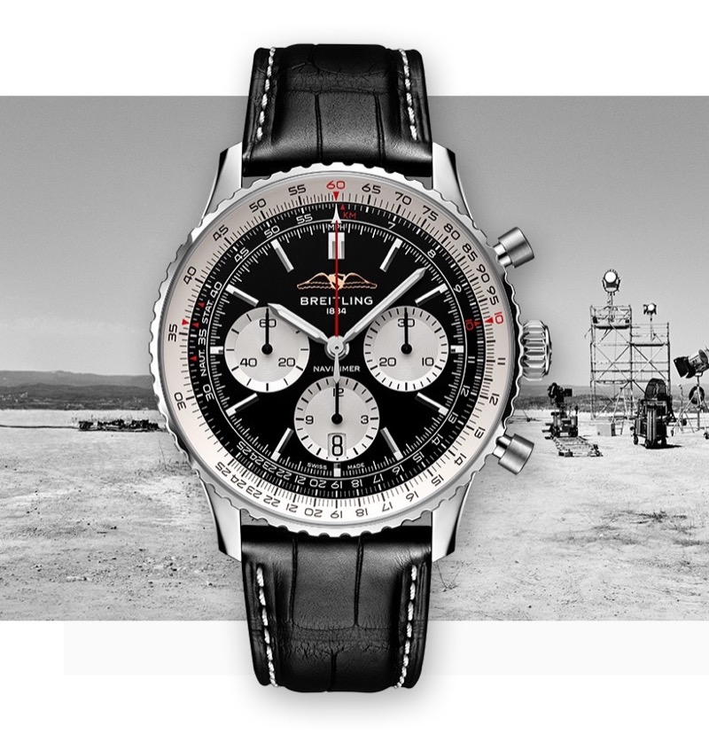 Breitling’s Navitimer channels aviator history through a black dial, silver accents, and sharp mechanical detail. » Austin Butler Makes Time for Breitling's Greatest Hits Breitling’s Navitimer channels aviator history through a black dial, silver accents, and sharp mechanical detail.