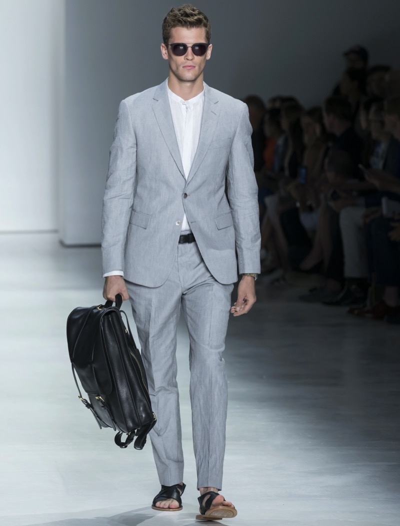 A relaxed take on the American suit, this look embraces light fabric and minimal styling. » How American, British & Italian Suits Make Their Mark A relaxed take on the American suit, this look embraces light fabric and minimal styling.