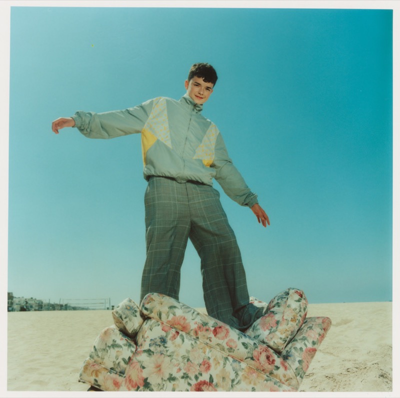 Owen Cooper wears a Louis Vuitton windbreaker with McQueen trousers for Flaunt.