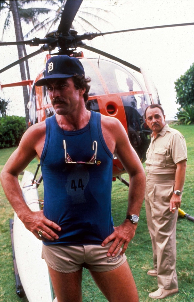 Tom Selleck wears short shorts on the set of Magnum P.I. » In Short Shorts, the Thigh Has the Last Word Tom Selleck wears short shorts on the set of Magnum P.I.