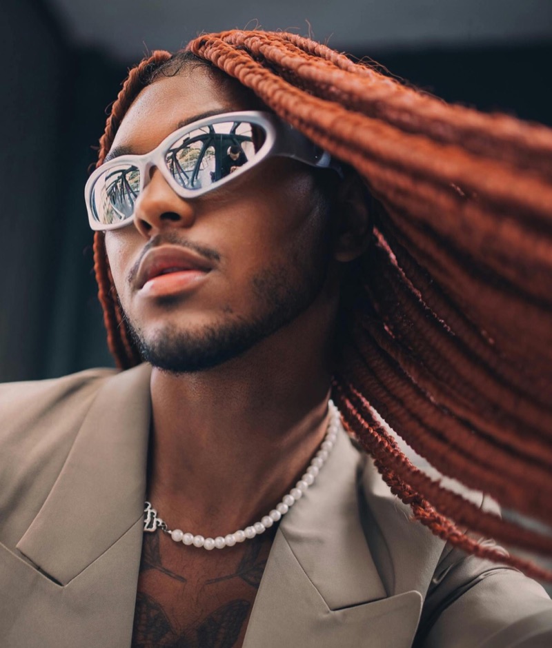 man wearing wraparound sunglasses