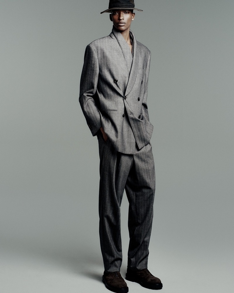Samuel Elie models a double-breasted suit from Giorgio Armani's fall-winter 2025 collection.