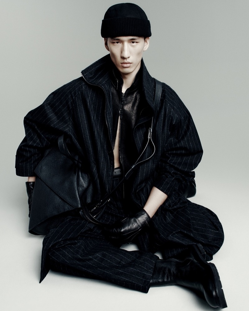 Long Li wears a pinstripe number from Giorgio Armani's fall-winter 2025 collection. 