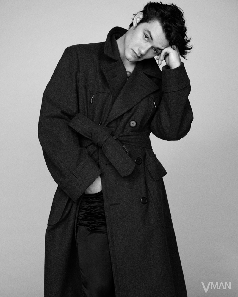 Louis Partridge wears a belted Prada trench for VMAN #55.