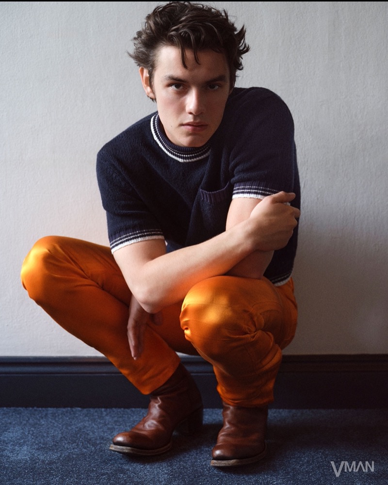 Louis Partridge wears a bold Prada outfit for VMAN.
