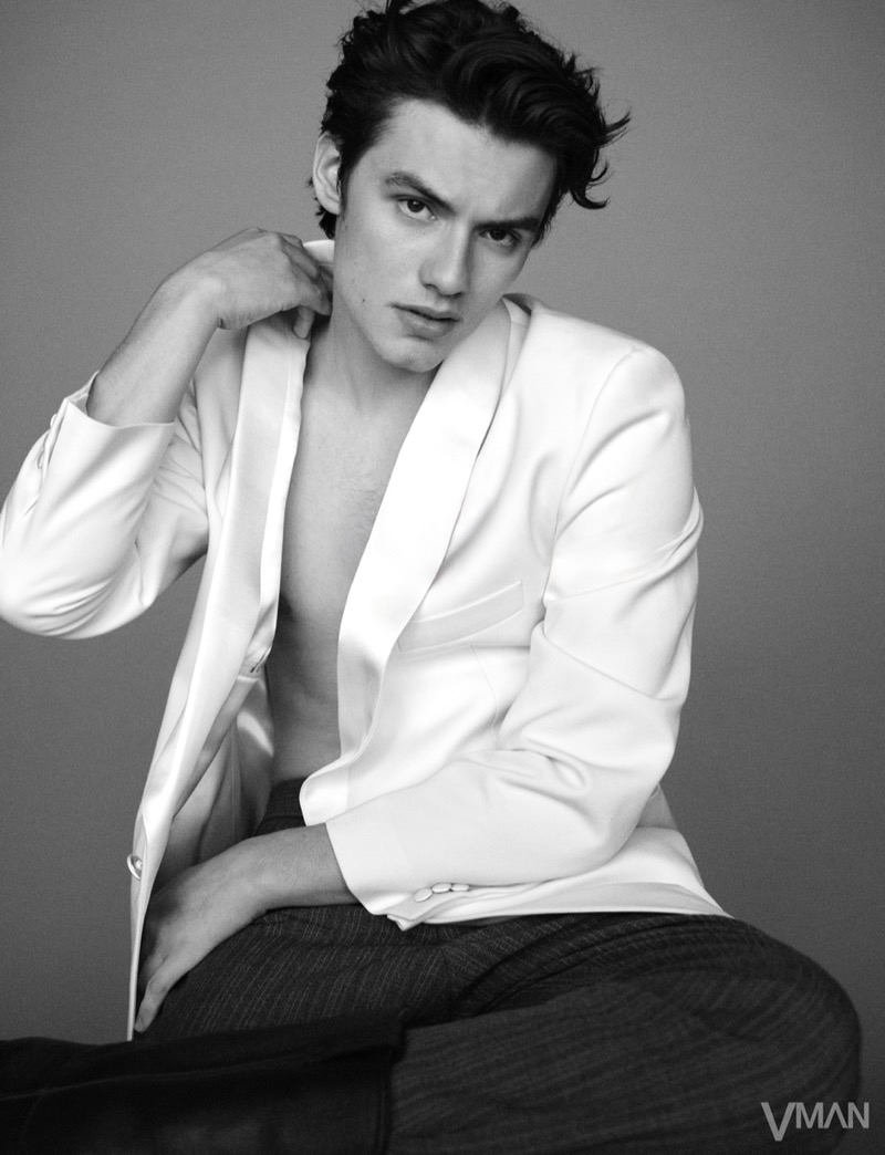 Louis Partridge wears an elegant Prada look for VMAN.
