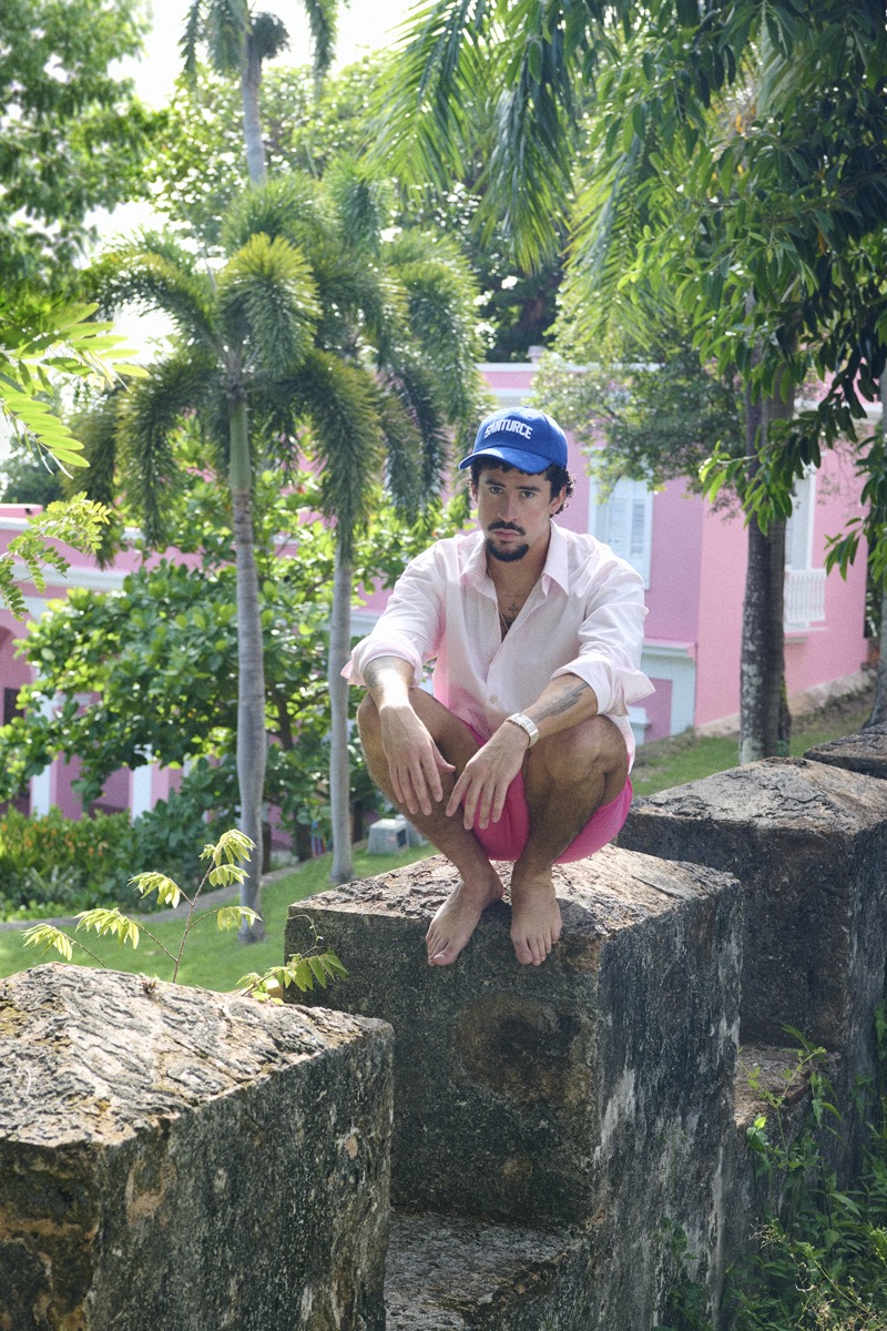 Bad Bunny wears pink Dries Van Noten shirt with Vilebrequin shorts