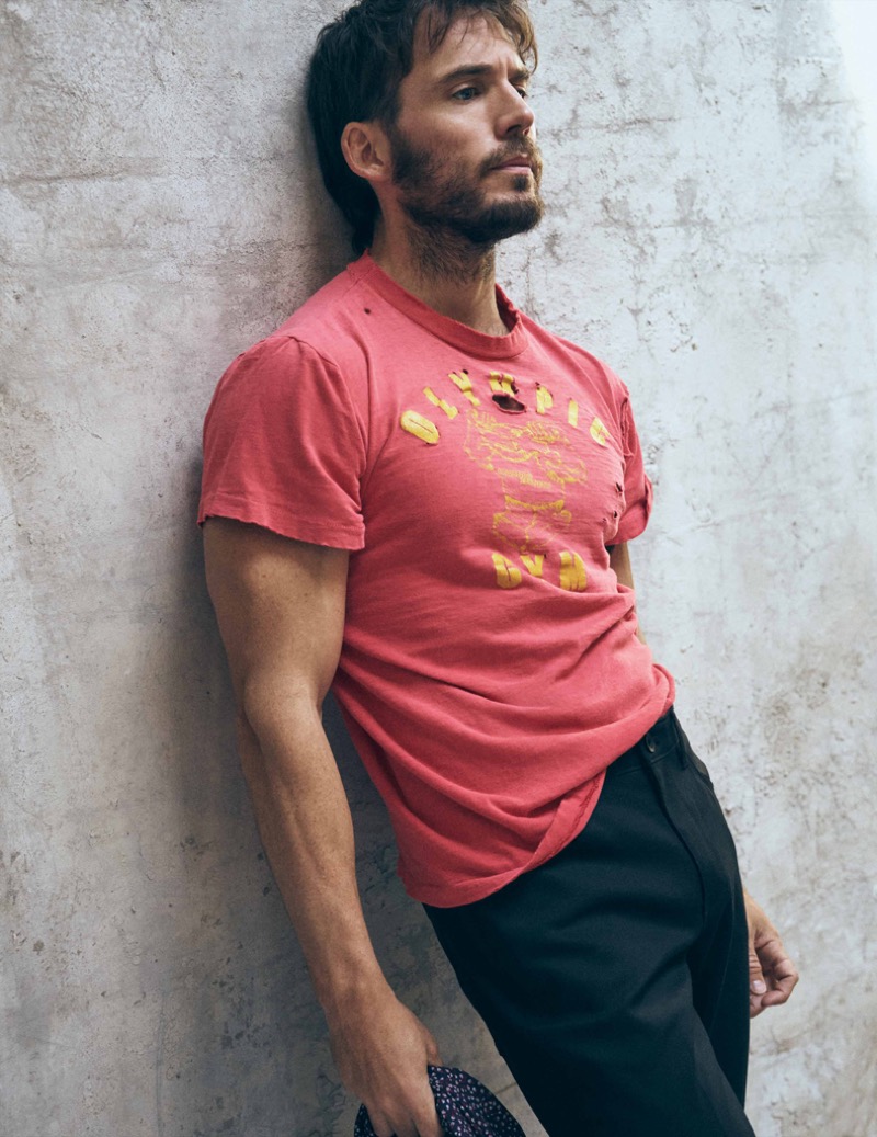 Sam Claflin wears vintage T-shirt with Perry Ellis Flaunt