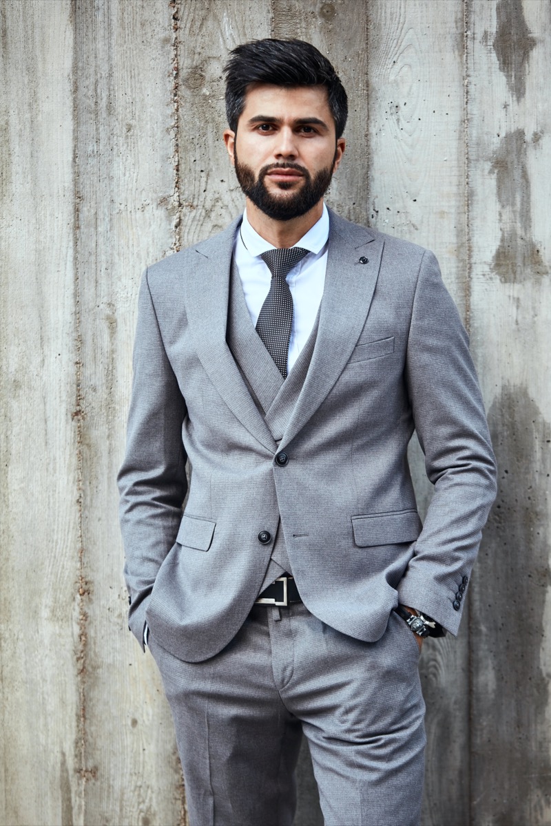 Grey suit men silver belt buckle