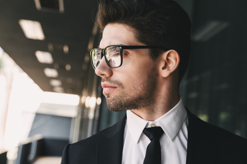 Man Wearing Black Framed Glasses with Suit