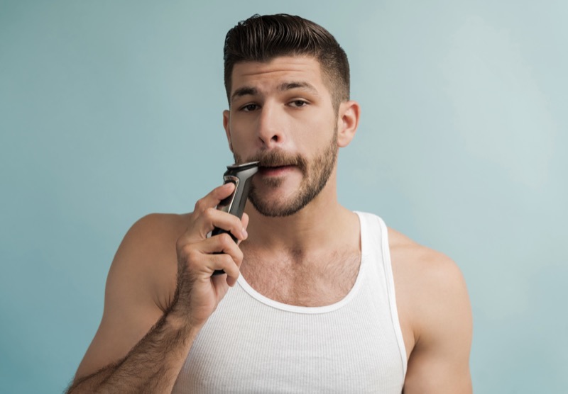 Man Trimming Mustache