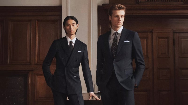 Taemin and Hugh wear BOSS Made to Order suits in a wood-paneled room
