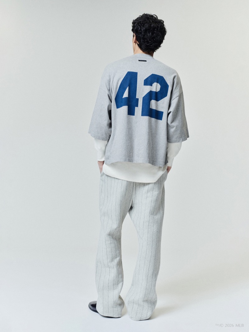 Rear view of the Fear of God Essentials Jackie Robinson Day merch tee showing the number 42 in blue