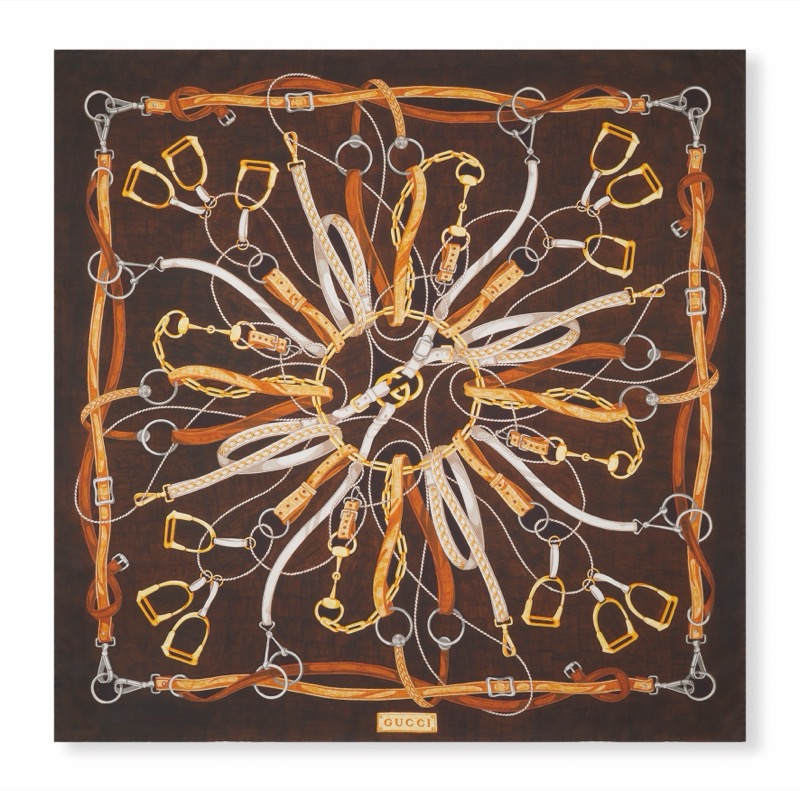 Gucci Art of Silk scarf with equestrian stirrups, straps, and buckles radiating from the center on a brown ground