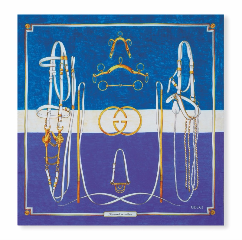 Gucci Art of Silk scarf with bridles, bits, and riding crops on a two-tone blue ground