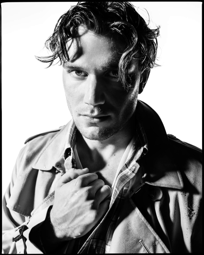 Jack wears a Burberry Kensington trench over a check shirt