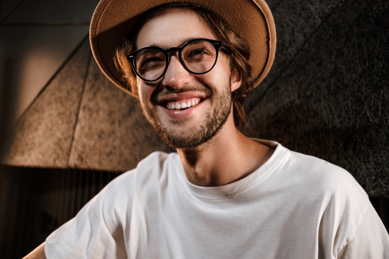 Man wearing round black glasses with keyhole bridge