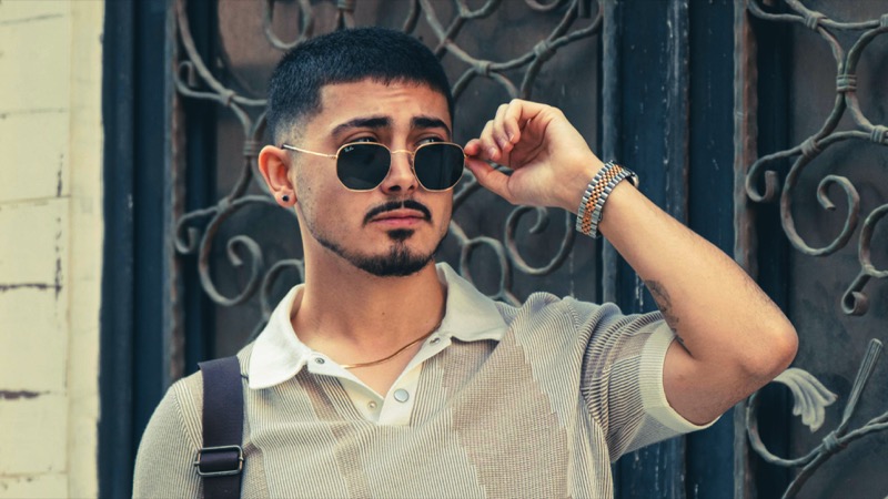 Man wearing smartwatch with metal strap