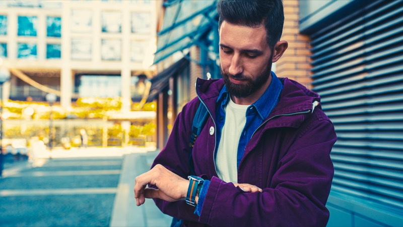 Man wearing smartwatch with woven strap